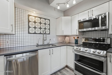 Striking mid-century modern 2 bed, 2 bath condo located at The