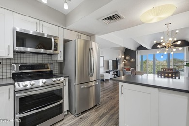 Striking mid-century modern 2 bed, 2 bath condo located at The