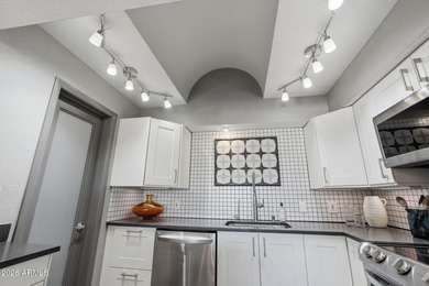 Striking mid-century modern 2 bed, 2 bath condo located at The