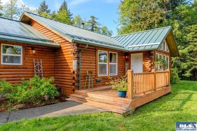 Tucked away on 4.7 beautiful acres, this stunning log home - photo 6