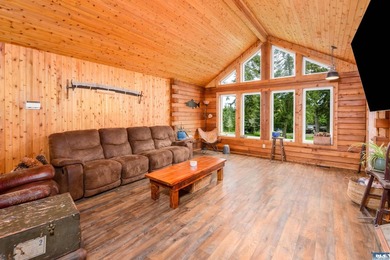 Tucked away on 4.7 beautiful acres, this stunning log home - photo 8