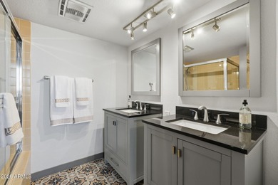 Striking mid-century modern 2 bed, 2 bath condo located at The