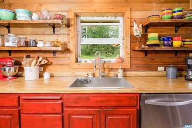 Tucked away on 4.7 beautiful acres, this stunning log home - photo 10