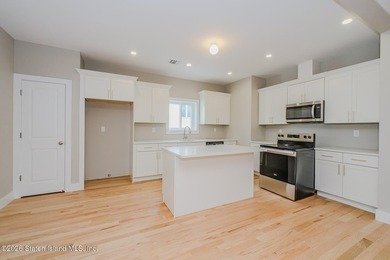 NEW CONSTRUCTION! Beautiful oversized TWO family 6/6 built with - photo 10