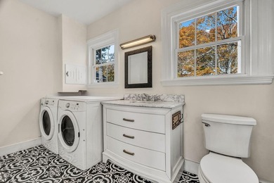 Set gracefully on 1.55 acres and positioned back from the road - photo 38