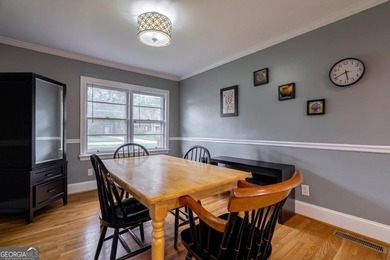 Experience the pinnacle of Normaltown living in this impeccably