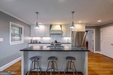 Experience the pinnacle of Normaltown living in this impeccably