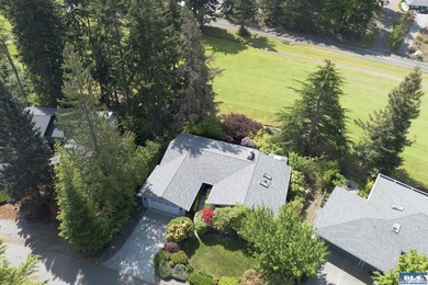 Tucked along the golf course-rather than surrounded by dense - photo 2