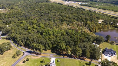 This spacious 1.01-acre partially cleared lot offers the perfect - photo 5
