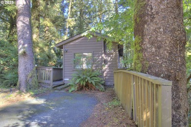 Tucked into a serene wooded setting alongside a peaceful creek - photo 1
