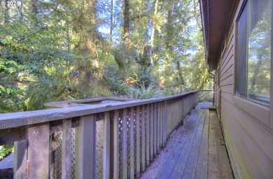 Tucked into a serene wooded setting alongside a peaceful creek - photo 2