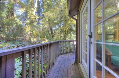 Tucked into a serene wooded setting alongside a peaceful creek - photo 3