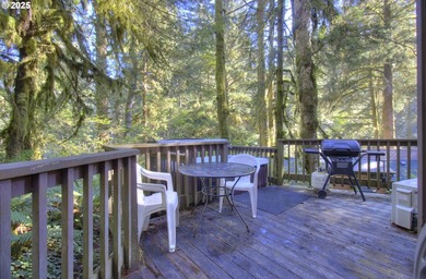 Tucked into a serene wooded setting alongside a peaceful creek - photo 4