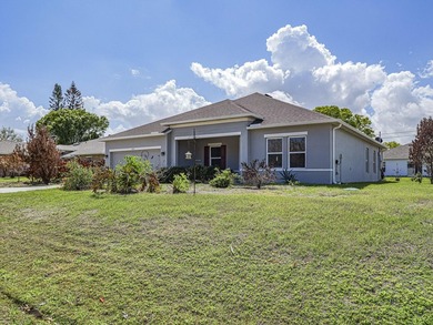 LIKE NEW beautiful 2022 built concrete block home located in the - photo 2