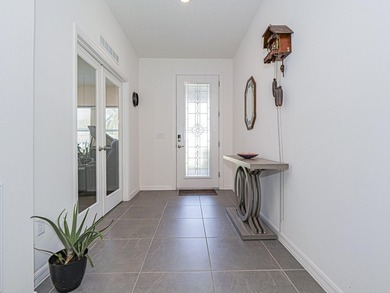 LIKE NEW beautiful 2022 built concrete block home located in the - photo 4