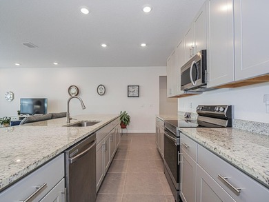 LIKE NEW beautiful 2022 built concrete block home located in the - photo 10