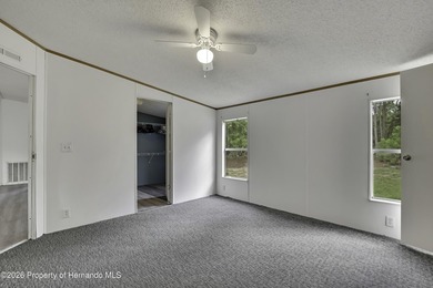 This nice spacious mobile home offers a well designed floor plan - photo 22