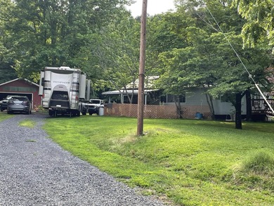 Charming 2-4 Bedroom Home with Bonus Tiny House on 2+- Acres