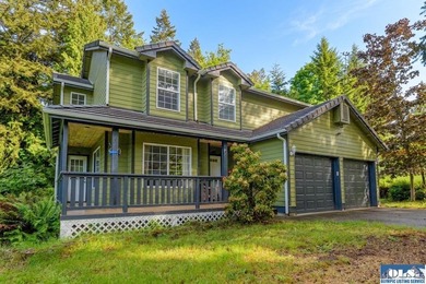 Welcome to this spacious 4-bedroom, 2.5-bath home on 5 peaceful - photo 1