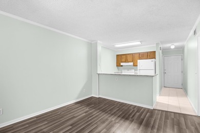 Discover coastal living at its best in Unit 303 at Eagle Lake, a - photo 12
