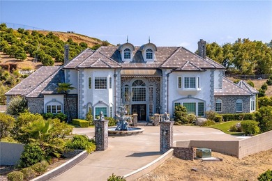 Positioned atop 20.22 fully fenced and gated acres, this stately - photo 14