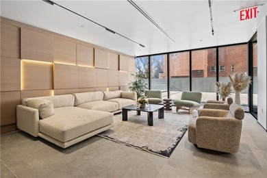 Residence 6E at Bayview Courtyard offers a serene waterfront - photo 5