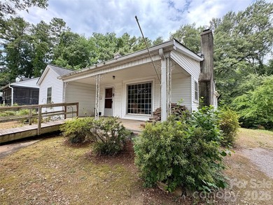 Just hit the market and has SO much potential! Come live, work - photo 3