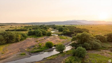 Discover an exceptional opportunity to own 1,265 acres of highly - photo 3
