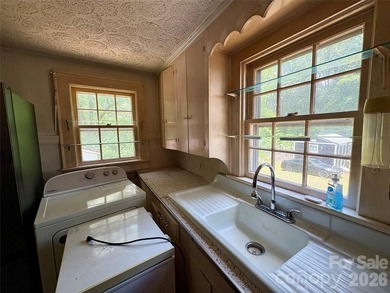 Just hit the market and has SO much potential! Come live, work - photo 8