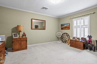 Located in the highly sought-after Country Club of Jackson