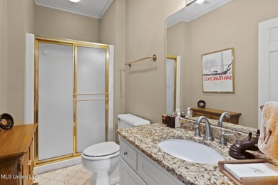 Located in the highly sought-after Country Club of Jackson