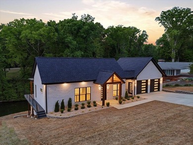 This new construction modern lake home is so fresh the walls - photo 25