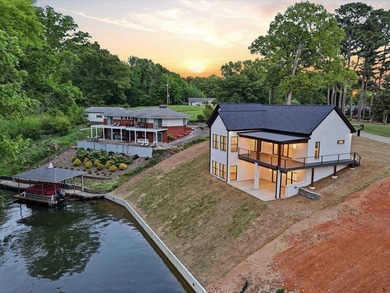 This new construction modern lake home is so fresh the walls - photo 26