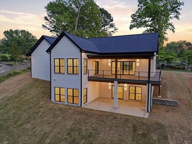 This new construction modern lake home is so fresh the walls - photo 27