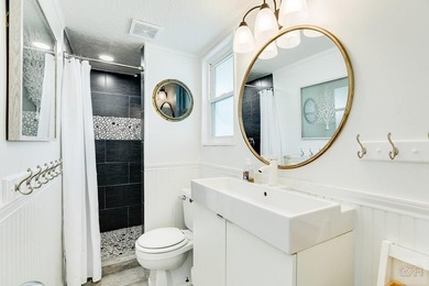 This inviting second-row beach house lives like a first-row - photo 32