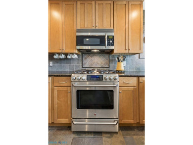 Step into this beautifully updated condo just in time for summer - photo 9