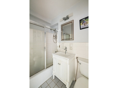 Welcome to Apartment 3F at 5800 Arlington Avenue, a bright and - photo 5