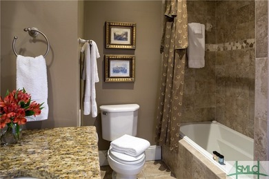 This classic Savannah gray brick townhome, located in the heart - photo 39
