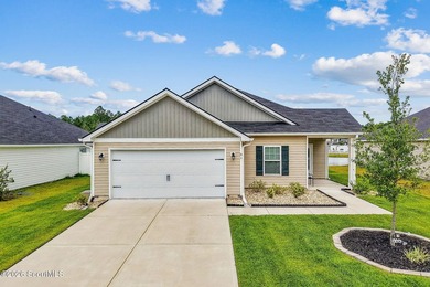 Built in 2023, beautifully maintained, and serving up pond views - photo 2
