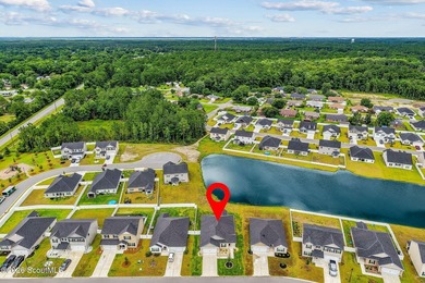 Built in 2023, beautifully maintained, and serving up pond views - photo 3