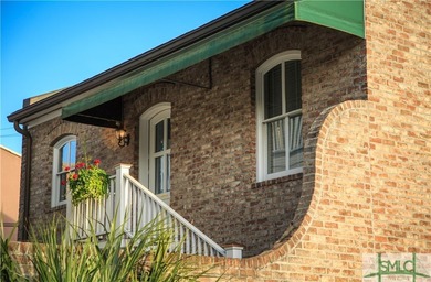 This classic Savannah gray brick townhome, located in the heart - photo 46
