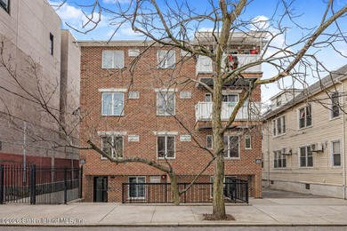 Welcome to this well-maintained 2-bedroom, 1.5-bath condo in the - photo 2