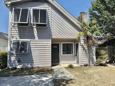 This charming three-bedroom, two-bathroom patio home is located - photo 1