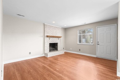 This charming three-bedroom, two-bathroom patio home is located - photo 3