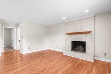 This charming three-bedroom, two-bathroom patio home is located - photo 4