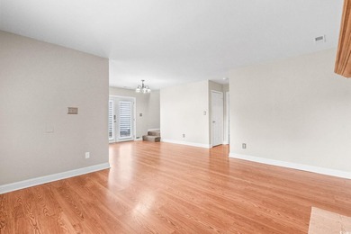 This charming three-bedroom, two-bathroom patio home is located - photo 5