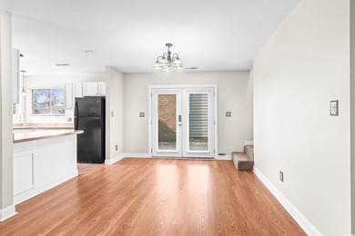 This charming three-bedroom, two-bathroom patio home is located - photo 7