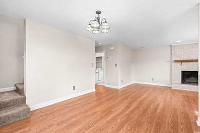 This charming three-bedroom, two-bathroom patio home is located - photo 8