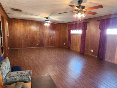 Welcome to the peaceful country life! Featuring over 5.5 acres