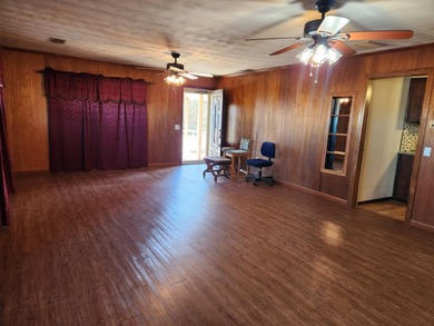 Welcome to the peaceful country life! Featuring over 5.5 acres